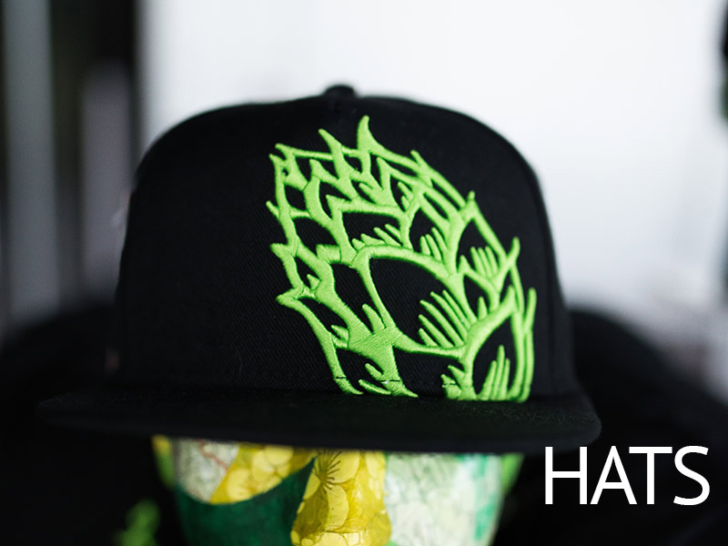 Shop Hats -- image of black hat with green hop