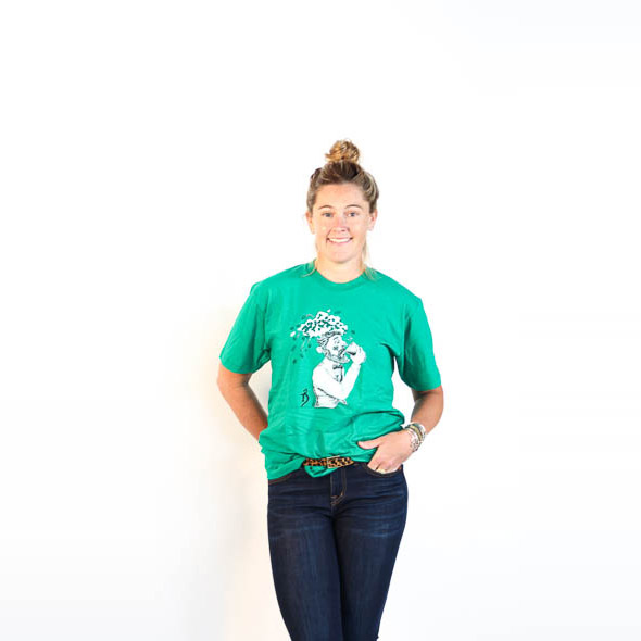 Female modeling Green tee with black and white Heady Topper logo.