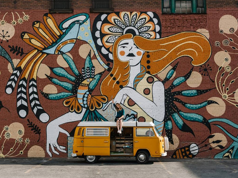 Click to view Dan Blakeslee website. Image by Blakeslee. Focal Banger logo. Bespectacled, wild-haired man sniffing beer can. Hops explode from ears and can.