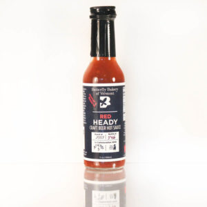 bottle of red heady hot sauce
