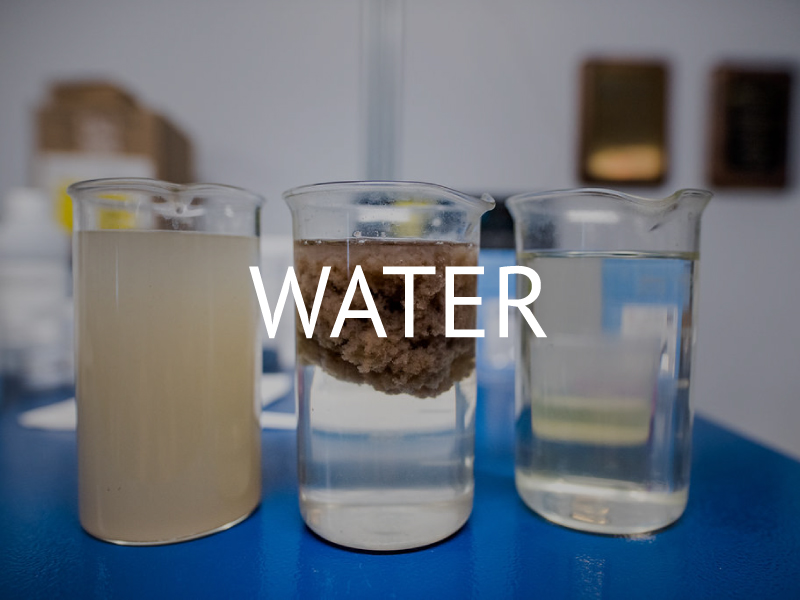 Image of wastewater treatment showing dirty & cleaned water