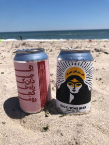 Two Back Home Beers on a beach